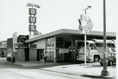 archival black and white image of bus stop
